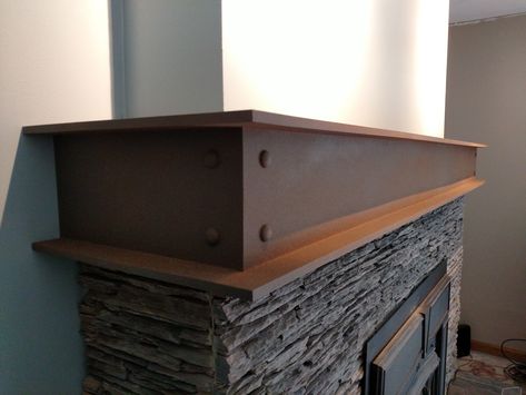 Faux Steel I-Beam Fireplace Mantle with Rivet Detail. stoneylakedesignco@gmail.com I Beam Mantel, Steel Beam Fireplace Mantel, Steel Mantel Fireplace, Metal Fireplace Mantle Ideas, Steel I Beam Ideas, Steel Fireplace Mantle, Industrial Fireplace Mantle, Faux Steel Beams Diy, Metal Fireplace Mantle