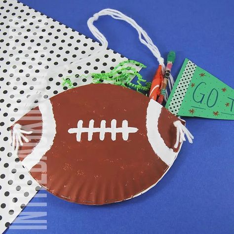 This paper plate football craft for kids is fun to make and even more fun to use. Fill the pouch with your favorite game time snacks or other little treasures. Perfect as a Super Bowl Craft for kids of any age with some assistance for the little ones. Limited craft supplies needed, and they're all on the master list we use for every craft we make. Football Crafts Kids, Superbowl Crafts, Football Crafts For Kids, Super Bowl Crafts, Dolphin Craft, Bowl Craft, Game Time Snacks, Free Craft Templates, Adaptive Art