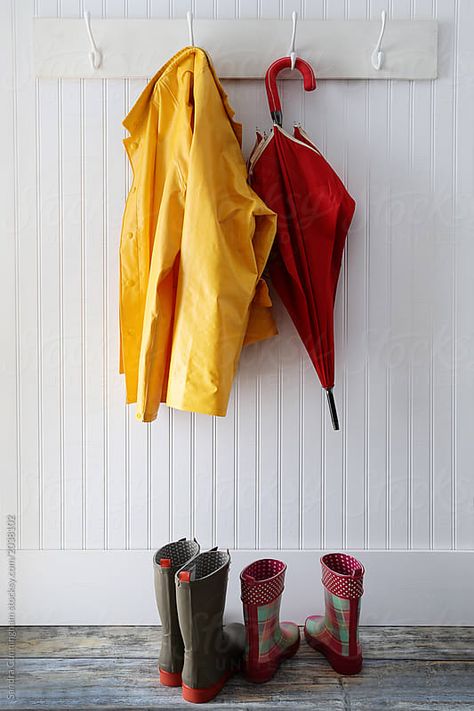 Rain gear with boots hanging on coat hooks Download this high-resolution stock photo by SANDRA CUNNINGHAM from Stocksy United. Dark Nautical Aesthetic, Jason Tattoo, Dark Nautical, Nautical Aesthetic, A Level Art Sketchbook, Yellow Coat, Still Life Fruit, Rain Gear, Promotional Design