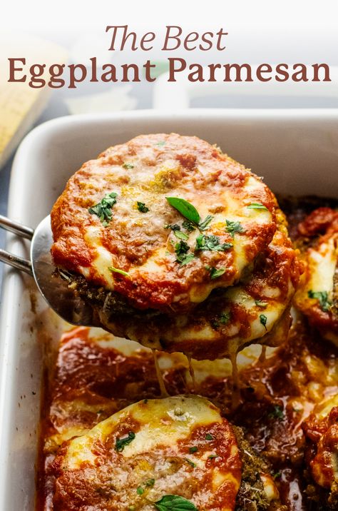 an image of a spatula lifting eggplant parmesan out of a white baking dish with the words "the best eggplant parmesan" above the image. Eggplant Parmeggiano, Eggplant Parm Sliders, Eggplant Parmesan Roll Ups, Eggplant Parm Stacks, Frozen Eggplant Recipes, Fried Eggplant Parmesan, Eggplant Parmesan Recipes, Best Eggplant Parmesan, Italian Eggplant Recipes