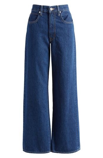 These wide-leg jeans are crafted from nonstretch, organic-cotton denim and finished in a classic blue wash for a look both fresh and timeless. 31" inseam; 21" leg opening; 11 1/2" front rise; 15 1/2" back rise (size Medium) Zip fly with button closure Five-pocket style 100% organic cotton Machine wash, tumble dry Made in the USA of imported fabric Dark Blue Straight Leg Jeans, Cute Jeans For Women, Jean Styles 2024 Women, College Style Outfits, Baggy Denim Jeans, Denim Wide Leg Pants, Chanel Loafers, High Waisted Wide Leg Jeans, Italian Summer Outfits