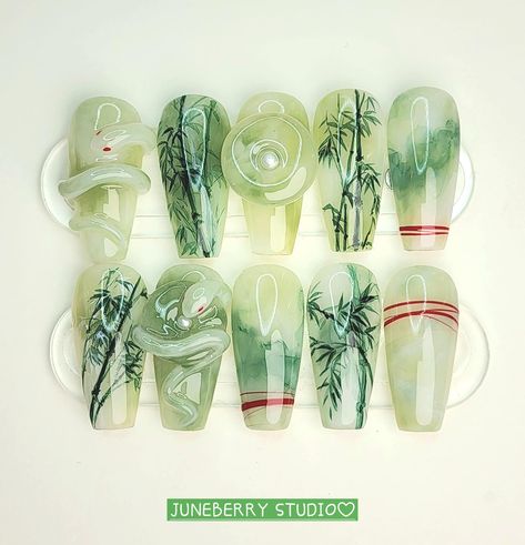 ✨ Hi, welcome to my little store! 💓 ✨ Here I have for you exclusive hand-painted nails that are salon-quality and original designs. If you love fancy nails with an artsy touch, and would like to take a dive into authentic Chinese aesthetics, this is your go-to place~ ✨ This elegant yet unique original design was inspired by traditional Chinese ink paintings, jade, and folktales. All the elements involved have auspicious meanings, a definite must-have for good luck and fortune ε(*･ω･ﾟ:･☆ 🍀 ✨ Ma Jade Nail Tutorial, Jade Inspired Nails, Green Chinese Nails, Nail Beauty Salon Design, Chinese Porcelain Nails, Jade Nail Art, Korean Green Nails, Jade Acrylic Nails, Nails Snake Design