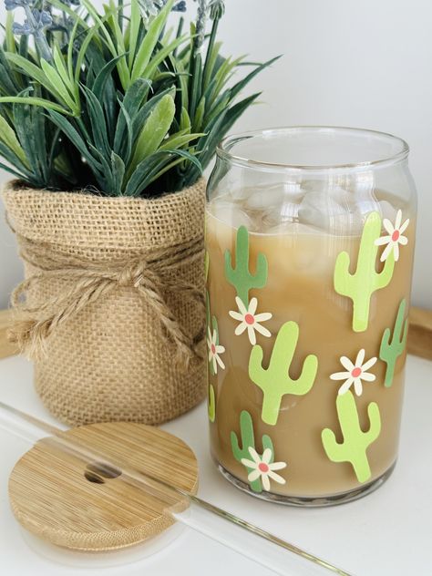 16oz can-style glass decorated with a cute cactus and daisy design. Accessorize with matching bamboo lid & glass straw. Coffee Cup Aesthetic, Morning Iced Coffee, Glass Iced Coffee Cup, Cup Aesthetic, Aesthetic Glass, Groovy Vibes, Libbey Glasses, Cup Wraps, Coffee Cup Design