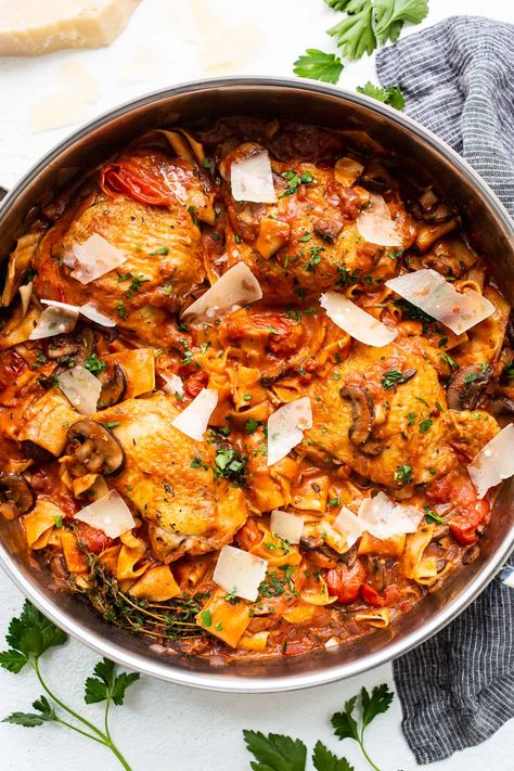 This one-pot pappardelle pasta with chicken thighs makes for the most delicious dinner. The chicken and pappardelle pasta are cooked in a creamy, rich sauce of onions, mushrooms, and tomatoes and topped with shaved parmesan cheese. Chicken Thighs And Pasta, Recipes With Chicken Thighs, Pappardelle Pasta Recipe, Chicken Mushroom Pasta, Easy Chicken Marinade, Pasta With Chicken, Fit Foodie Finds, Recipes With Chicken, Pappardelle Pasta