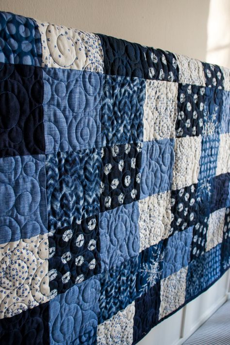 This beautiful blue scrappy patchwork quilt is created  with random squares to make your eye move around the quilt. The colors range from a deep navy blue to a medium denim blue.  It's also  been quilted in blue thread to give it a whimsy feel.   This type of quilt  would be perfect for any baby. It would also make a great baby shower gift. I recommend that you wash this on delicates  in cold water and dry on low or air dry. Quilts For Men Patterns, Denim Quilt Patterns, Blue Quilt Patterns, Scrappy Patchwork, Navy Blue Quilt, Blue Jean Quilts, Patchwork Quilting Designs, Jean Quilt, Patchwork Inspiration