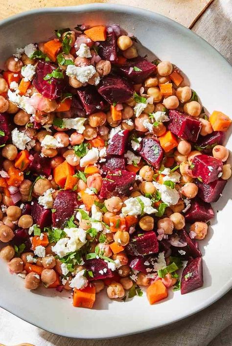 This chickpea, beet & feta salad is a vibrant blend of flavors and textures, marrying the earthy sweetness of beets with the creamy richness of feta cheese, all tied together with a zesty lemon-garlic dressing Weight Watchers Side Dishes, Beet Feta Salad, Girlfriend Dinner, Healthy Thanksgiving Dessert, Bean Salad Recipes Healthy, Gina Livy, Bean Salad Healthy, Garlic Vinaigrette, Thanksgiving Dessert Recipes