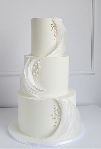 Sugarsneg | Wedding Cakes - The Knot Weddings Cakes Unique, White Cakes Wedding, Cakes Wedding Elegant, Draped Wedding Cake, Wedding Cake Modern Elegant, Wedding Cake Designs Elegant 2024, Wedding Cake Ideas Elegant Beautiful, Modern Wedding Cake Unique, Wedding Cakes Elegant Unique