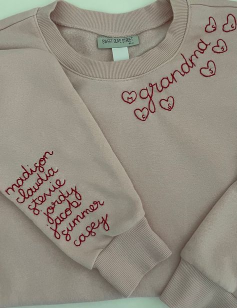 Grandma's favorite names hand stitched in red thread on a cozy faded pink sweatshirt.   Sweatshirts are Unisex sizing and run true to size.  I suggest sizing up for a more oversized fit. 70/30 cotton/polyester 3-End fleece, ring spun cotton  *Please note that all sweatshirts for this listing are for faded pink long-sleeved crewneck with set-in rib neckband, cuffs & hem band. If you are looking for a specific color sweatshirt please message me and I'll see what I can do. Returns and Exchanges: I Embroidered Clothes Ideas, Embroidered Sweatshirt Diy, Embroidery Sweater Diy, Sweatshirts Ideas, Grandma Sweatshirt, Embroidery Sweater, Diy Sweatshirt, Hand Embroidery Projects, Embroidery On Clothes