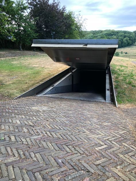 Secret Entrance, Casa Fantasy, Doomsday Bunker, Earth Sheltered Homes, Underground Shelter, Underground Garage, Underground Parking, Earth Sheltered, Underground Bunker