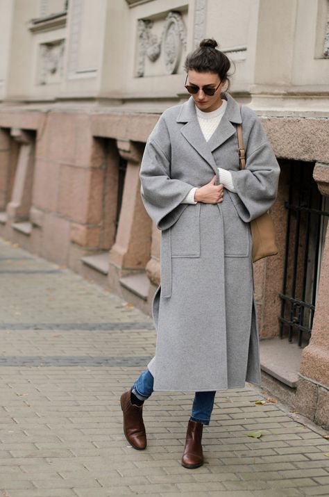 Light gray wool coat is designed with its oversized fit and lowered shoulders line. The notch collar adds a touch of sophistication, while the two patch pockets offer both style and functionality. With two side slits for ease of movement, this coat is as practical as it is stylish. Complete with a belt for, this long oversize wool coat is the perfect addition to your winter wardrobe.  Coat fabric: 100% wool Lining: 100% viscose SIZE All our clothes are made to order, so please allow 5 - 7 busine Light Grey Coat Outfit, Grey Coat Outfit, Camel Coat Outfit Classy, Grey Coats, Wool Coat Outfit, Grey Overcoat, Camel Coat Outfit, Oversized Wool Coat, Mode Mantel