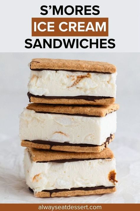 Indulge in the ultimate frozen s'mores experience! Delicious layers of graham crackers, creamy chocolate, and homemade toasted marshmallow ice cream come together in this dreamy ice cream sandwich. Perfect for hot summer days! Smores Ice Cream Sandwich, Frozen Smores, Marshmallow Ice Cream, Smores Ice Cream, Homemade Chocolate Candy, Homemade Ice Cream Sandwiches, Graham Cracker Recipes, Seasonal Baking, Seasonal Desserts