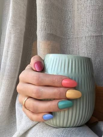 14 Easy Nail Art Designs You Can Definitely Do at Home — See Photos, Product Recommendations | Allure Fun Multicolor Nails, Three Colour Nails, Multi Colored Ombre Nails, Colorful Nail Polish, Pastel Multicoloured Nails, Matte Rainbow Nails, Cute Nail Color Combos, Gel Nails Multicolor, Multiple Color Nails