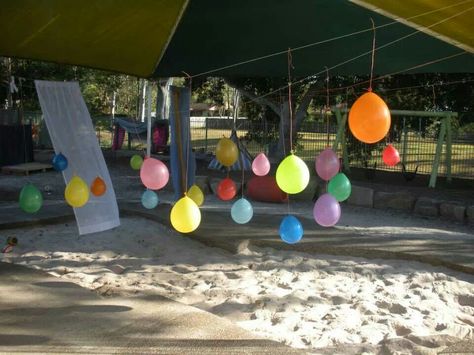 Outside play area, tie string across box trailer and tie water balloons to use as target practice with balls - different coloured water in balloons Sandpit Activities, Outside Play Area, Outdoor Montessori, Generational Living, Childcare Rooms, Outside Play, Outdoor Play Space, Outdoor Nursery, Sand Pit