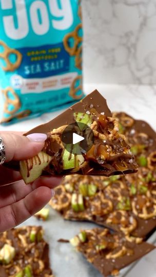 77 reactions · 16 shares | Caramel Apple Pretzel Bark! The perfect fall treat that is super simple to make and tastes great—combines the best flavors of caramel apples, chocolate, and pretzels!

Ingredients 
8 oz chocolate chips 
1 tbsp coconut oil
20-25 sea salt pretzels
1 green Granny Smith apple
1/2 cup caramel sauce 
Flaky sea salt 

Instructions 
In a bowl, add the chocolate chips and coconut oil.
Microwave for 2-3 30-second increments until fully melted, stirring in between. Repeat as needed. Next, chop the apple into small pieces and set aside. On a parchment lined baking sheet, spread the chocolate into an even layer. Reserve some of the chocolate to drizzle on at the end. Next, add the pretzels in rows.
Spread the apple pieces on top. Drizzle caramel sauce on top, followed by rema Apple Pretzel Bark, Chocolate And Pretzels, Pretzel Chocolate Bites, Apple Pretzels, 2 Ingredient Cookies, Pretzel Bark, Salted Caramel Pretzels, Pretzel Bars, Salted Pretzel