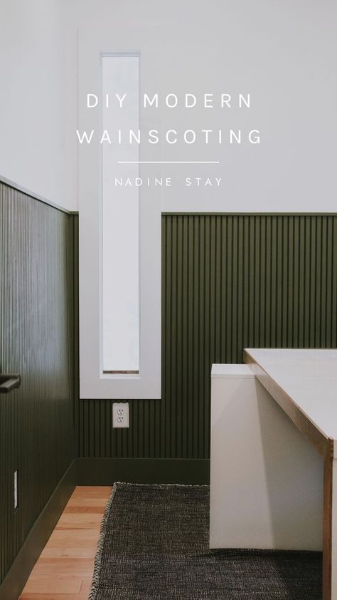 Installing modern wainscoting in our home office - full tutorial. DIY modern wainscoting. Office makeover by Nadine Stay. Vertical slats painted in a rich hunter green. Full tutorial - how to install modern wainscoting in your home. #wainscoting #moderndesign #diy #diyproject #huntergreen #interiordesign #homerenovation #modernwainscoting #homedesignideas Wainscoting Office, Modern Wainscoting, Nadine Stay, Ruangan Studio, Vertical Slats, Architecture Renovation, Office Makeover, Hus Inspiration, Slat Wall