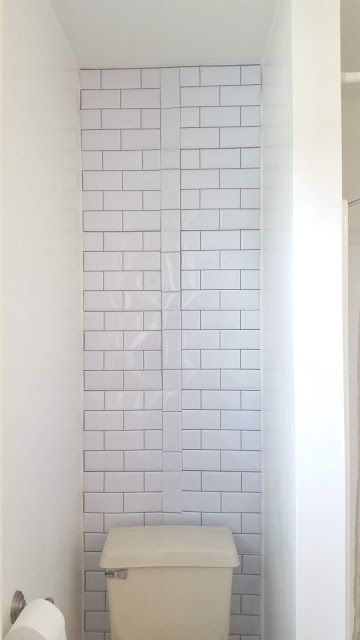 Dollar Tree Peel and Stick Subway Wall | Shanetta DIY Life Dollar Tree Wall Tiles, Peel And Stick Subway Tile, Wall Tiles Bathroom, White Subway Tiles, Wall Diy, White Subway Tile, Peel And Stick Tile, Bathroom Wall Tile, Stick On Tiles