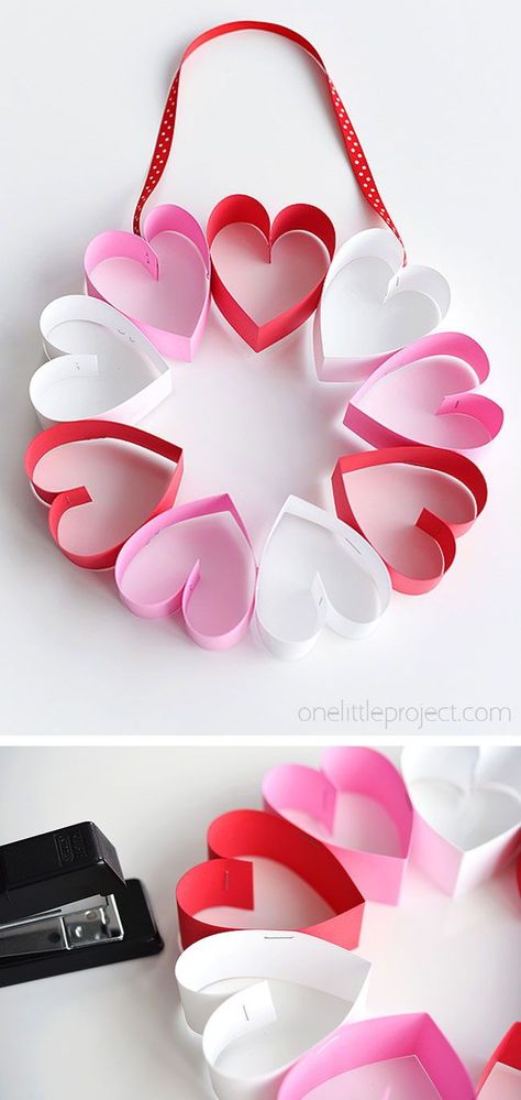 This stapled paper heart wreath is such a fun and EASY Valentine's Day craft to make with the kids! Seriously, who would have thought that making paper hearts would be so easy!? It's a great little wreath to hang on a bedroom door (or school classroom door?) and it makes a super cute and simple Valentine's decoration! Paper Heart Wreath, Valentine Paper Crafts, Heart Wreaths, February Crafts, Easy Valentine Crafts, Diy Valentine's Day Decorations, Valentine's Day Crafts For Kids, Preschool Valentines, Diy Valentines Decorations