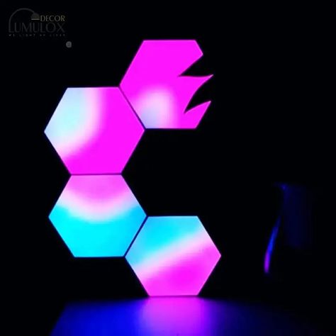 Luna is a modular LED wall light with a brilliant design, easy to install and use. It's the perfect solution for your bedroom or the living room. Use the APP or Remote control to change the brightness and colors. PRODUCT SPECIFICATION: Voltage: 5V Wattage: 0-5W Material: Acrylic Power Supply: USB 5V 2A Size: 9*10*1.8 cm Variants Available: Bluetooth APP Control with Music control or Bluetooth APP Control with Remote Control Certifications: CE, FCC, ROHS Modular Lights, Decor Essentials, Ultra Modern, App Control, Chandelier Pendant Lights, Led Wall, Light Table, Ceiling Pendant Lights, Wall Light