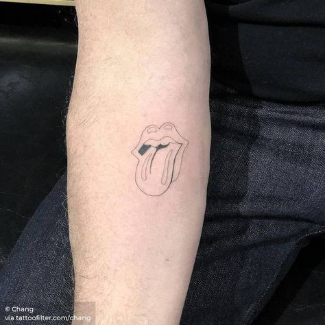 Lips with the tongue out tattoo on the arm | www.otziapp.com Rock Tattoo Music, Tattoo Stone, Rock And Roll Tattoo, Stones Tattoo, Rock Tattoos, Tongue Tattoo, Rolling Stones Tattoo, Mouth Tattoo, Stone Tattoo