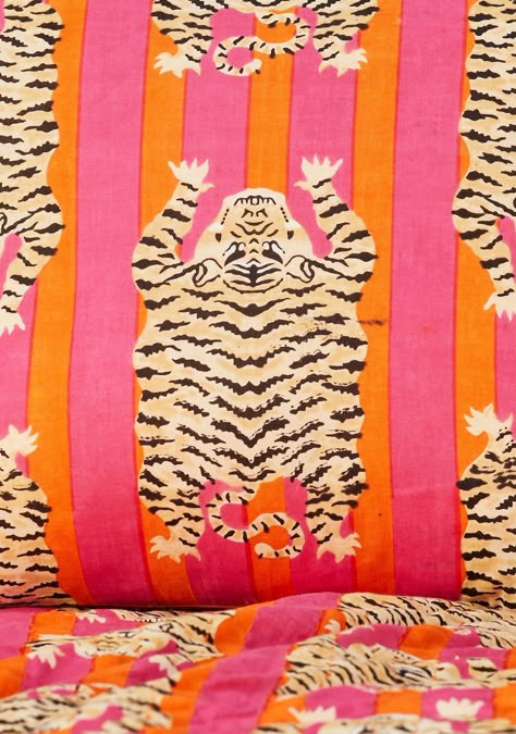 Bold Tiger Print Cushion Cover Unleash your wild side with this vibrant tiger print cushion cover. Featuring a striking combination of orange and pink stripes adorned with playful tiger motifs, this cushion is a statement piece that will transform your space. Traditionally hand-printed on both sides, ensuring a captivating look from every angle. Crafted from 100% cotton, this cushion cover is not only visually stunning but also soft and comfortable. The concealed matching zip adds a touch of elegance. Complete the look with our matching kantha throw for a truly indulgent experience. Material: 100% Cotton Size: 45 x 45cm Handmade in India Wallpaper Layouts, Stripe Cushion, Leigh On Sea, Sitting Rooms, Soft Furnishings Cushions, Eclectic Bedroom, Striped Cushions, Printed Cushion Covers, Stationery Craft