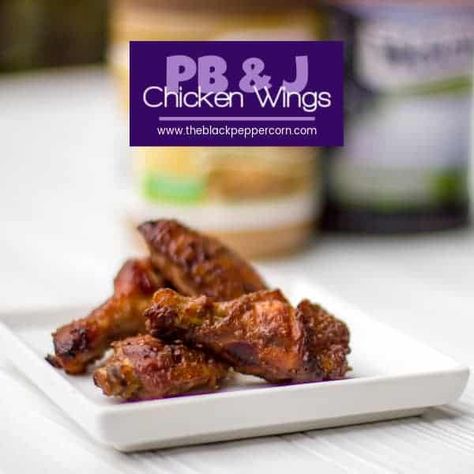 These sticky PB&J wings have a sweet tangy flavour that resemble Thai peanut satay flavours. Not many ingredients in this recipe (peanut butter, jam, juice, vinegar) , these wings are easy to make and are delicious via @blackpeppercorn Peanut Butter And Jelly Wings Recipe, Sweet Chili Chicken Wings, Peanut Satay, Easy Chicken Wing Recipes, Sweet Chili Dipping Sauce, Easy Chicken Wings, Baked Wings, Thai Peanut, Peanut Chicken