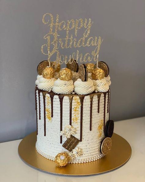 A towering buttercream cake with dark chocolate drips, buttercream swirls and tasty chocolates. The perfect addition to any special occasion. Complete with a glittering gold birthday topper. Vanilla Oreo Cake, Cake Chocolate Ganache, Super Moist Chocolate Cake, Vanilla Oreo, Buttercream Birthday Cake, Candy Birthday Cakes, Chocolate Cake Designs, Chocolate Drip Cake, 21st Birthday Cakes