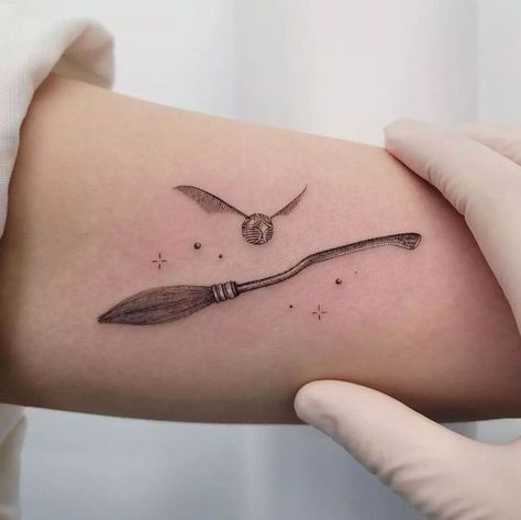 Gryffindor Tattoo Small, Nimbus 2000 Tattoo, Harry Potter Snitch Tattoo, Wand Tattoo Harry Potter, Quidditch Tattoo, Hagrid Tattoo, Nimbus Tattoo, Small Harry Potter Tattoo Ideas, Harry Potter Tattoo Designs