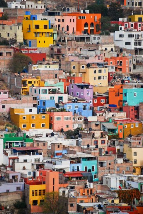 It makes sense that this city is filled with many artists since just about every house sports a different color. Visitors can take a cable car up and down the hill to take in the views without working up a sweat. Spanish Towns, Colourful Buildings, Visit Mexico, Mexico Travel, Oh The Places Youll Go, World Heritage Sites, House Colors, Rio De Janeiro, Cityscape