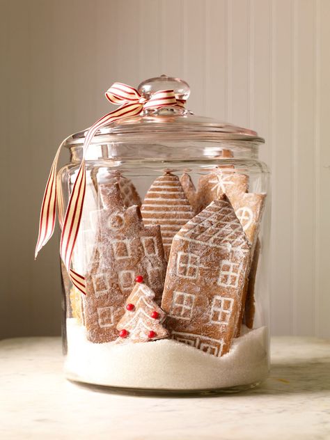 Gingerbread decorations are among the best Christmas decor ideas since you can eat them after you enjoy their beauty! Start with our classic gingerbread recipe, use our template to shape a gingerbread city, and sprinkle with powdered sugar. Christmas Table Ideas, Table Decoration Christmas, Table Decorations Christmas, Cool Gingerbread Houses, Gingerbread House Recipe, Table Decor Christmas, Candle Table Centerpieces, Christmas Table Decoration, Festive Centerpieces