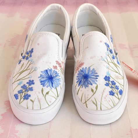 Hand painted Vans Classic slip ons, with embroidered details. A bride-to-be asked me to paint these in her wedding color palette, and I'm so grateful that she did 😊🙏 People usually ask me to paint most of the available area - these are more minimal, with a clean look. I love how they turned out 😍. What do you prefer? A mostly minimal aesthetic, or a fuller maximalist one? Let me know in the comments 🌸 #customsneakers #weddingsneakers #somethingblue #customvans #handpaintedshoes #paintedvans Painting White Shoes Ideas, Easy Shoe Painting Ideas, Hand Painted Vans, Wedding Vans, Vans Classic Slip, Painted Vans, Wedding Sneakers, Cute Shoes Heels, Hand Painted Shoes