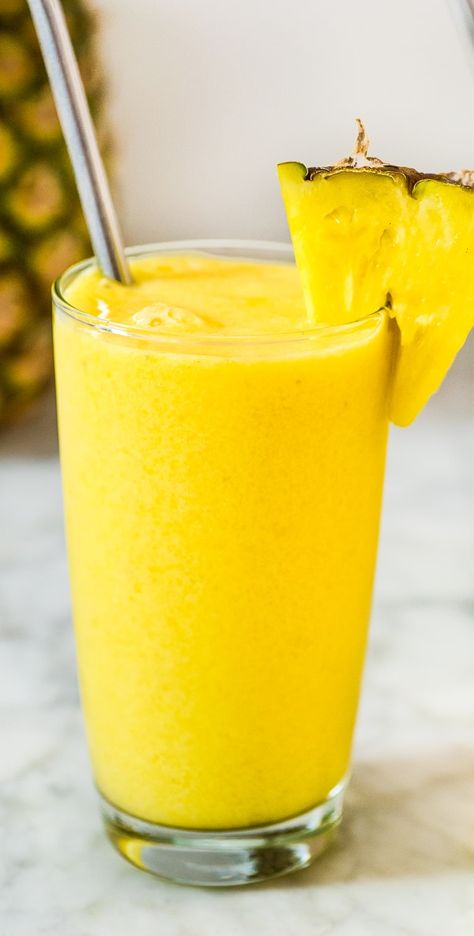 This Tropical Smoothie is easy to make and it tastes incredible. Whether you are looking for a light breakfast or a tasty afternoon treat, you'll definitely enjoy this sunny goodness!﻿ #smoothie #tropical #mango #pineapple #healthyeating #drink #recipeoftheday Yellow Smoothie, Recipes Pineapple, Tropical Smoothie Recipes, Pineapple Detox, Cafe Recipes, Banana Drinks, Pineapple Water, Smoothie King, Light Breakfast