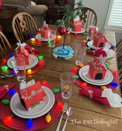 Charlie Brown Christmas Themed Dinner, Charlie Brown Christmas Table Decor, Peanuts Themed Christmas Party, Themed Christmas Movie Dinners, Charlie Brown Theme Party, Charlie Brown Christmas Movie Night, A Charlie Brown Christmas Party, Peanuts Christmas Party, Charlie Brown Christmas Party Ideas