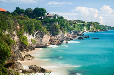 Scenic landscape of high cliff on tropical white sand Pantai beach in Bali, Indonesia by ifnotelse on @creativemarket Food In Bali, Balinese Food, Bali Tour Packages, Bali Tour, Bali Guide, Florida Camping, Voyage Bali, Jimbaran, Kuta