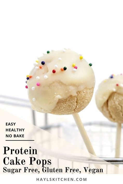 Kinda pretty but still healthy Protein Cake Pops made with just 4 ingredients, and no bake too! These low calorie high protein cake bites are Vegan, gluten free and sugar free; A great birthday cake protein snack or dessert recipe. Herbalife Protein Cake Pops, Herbalife Cake Pops Recipe, Protein Cake Balls, High Protein Cake, Vanilla Protein Cake, Protein Cake Pops, Protein Powder Cake, Healthy Cake Pops, Food Polls