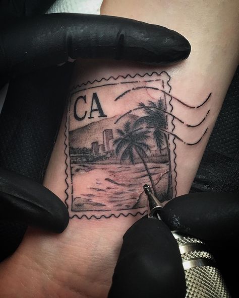 High Voltage Tattoo on Instagram: “The perfect way to remember your stay in LA! Sick stamp tattoo done today  by @saigonkicker #california #palmtree #losangeles…” San Diego California Tattoo Ideas, Cali Inspired Tattoos, California Sleeve Tattoo Ideas, Tattoo Ideas California, California Stamp Tattoo, California Tattoo For Women, California Tattoo Sleeve, Hotel California Tattoo, Socal Tattoo