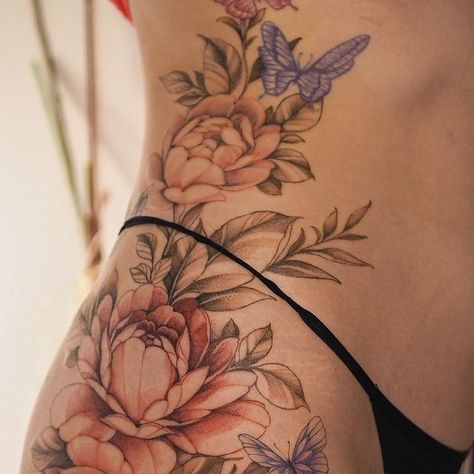 Coloured Back Tattoo Women, Colourful Back Tattoos Women, Lotus Belly Tattoo, Floral Hip Piece, Stomach Tattoo Flowers, Beautiful Side Tattoos, Flower Hip Tattoo Thigh Piece, Floral Hip Tattoo Thigh Piece, High Thigh Tattoo