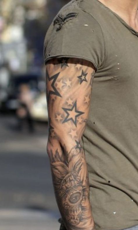 Star Tattoo Sleeve For Men, Cloud Tattoo With Stars, Star Tattoo Men Arm, Forearm Star Tattoo Men, Stars Arm Tattoo Sleeve, Clouds Stars Tattoo, Bicep Men Tattoo, Star Sleeve Tattoo Men, Men’s Star Tattoo