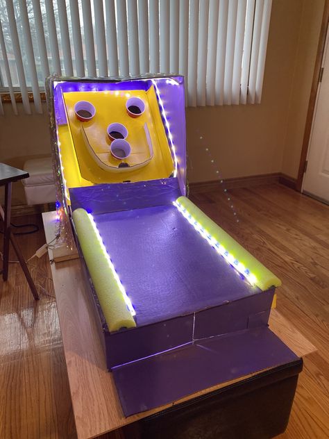 Diy Basketball Arcade Game Cardboard Boxes, Diy Skee Ball Homemade, How To Make A Cardboard Arcade Game, Cardboard Skeeball Game, Arcade Games Cardboard, At Home Arcade Games Diy, Carnival Skeeball, Cardboard Box Games Diy, Arcade Games Diy Cardboard Boxes