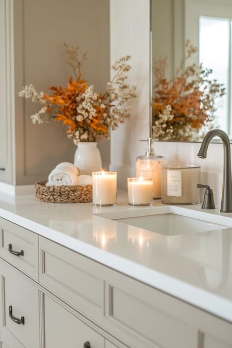 15 Fall Bathroom Decor Ideas You'll Love Bathroom Decor Guest Bath, Bathroom Decor For Fall, Half Bath Fall Decor, Fall Bathroom Counter Decor, Bathroom Thanksgiving Decor, Terra Cotta Bathroom Decor, Bathroom Guest Decor, Fall Vanity Decor, Fall Bathroom Aesthetic