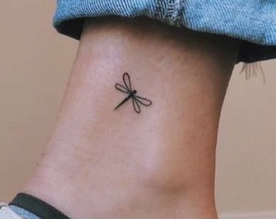 Simple Tattoos Dragonfly, Women With Dainty Tattoos, Dragonfly Simple Tattoo, Tiny Dragonfly Tattoo Simple, Minimalist Dragonfly Tattoo Simple, Small Tattoo Dragonfly, Simple Dragon Fly Tattoo Design, Dragonfly Tatoos Ideas, Minimalistic Dragonfly Tattoo