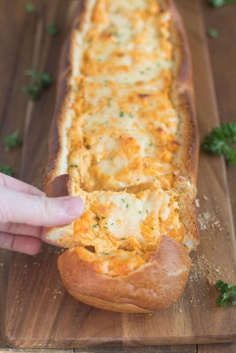 Buffalo Chicken Stuffed Bread is crusty artisan bread filled with buffalo chicken dip. It is a perfect party or game day appetizer. Chicken Stuffed Bread, Buffalo Chicken Bread, Crusty Artisan Bread, Chicken Bread, Stuffed Bread, Pan Relleno, Chicken Stuffed, Cheesy Bread, Chicken Dip