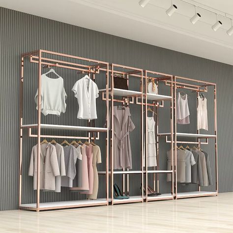 Clothes Rack Design For Shop, Ladies Shop Interior Design, Clothing Racks For Boutique, Cloth Shop Interior Design Retail, Clothing Shop Interiors, Boutique Shop Interior, Regal Clothes, Ideas De Boutique, Rose Gold Furniture