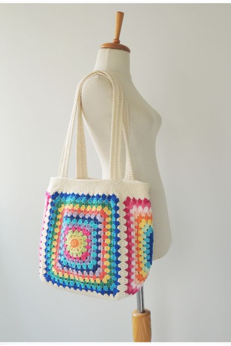 The classic of all time is granny square.It is very fun for me to make granny square bags with colorful cotton yarns.

The Crochet Purse has enough space to carry all your essentials and is durable.

Amazing style aside, this cottagecore bag also features handcrafted.
If you like the hippie stlye ,this hippie bag will be perfect choice for you.
The patchwork tote bag will be send thoughtfully wrapped and secure.

Large Tote bag has enough space for all your essentials. Granny Square Bag Crochet, Square Bag Crochet, Cottagecore Bag, Patchwork Tote Bags, Estilo Hippy, Rainbow Bag, Flower Tote, Floral Tote Bag, Granny Square Bag