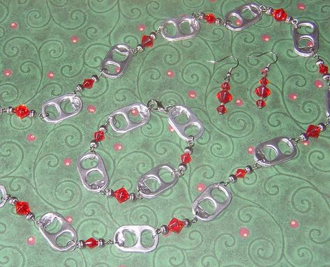 Red Pop Tab Necklace, Bracelet, and Earrings | Pop tab jewel… | Flickr Pop Tab Jewelry, Pop Tab Necklace, Tab Jewelry, Tab Necklace, Pop Tab Crafts, Safety Pin Jewelry, Aluminum Can Crafts, Glass Beads Necklace, Pop Tabs