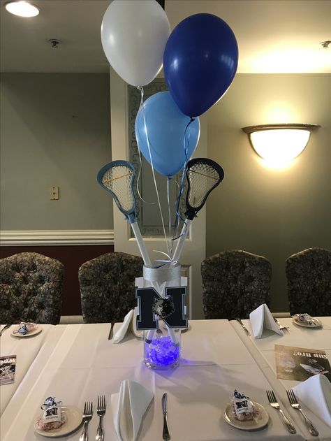 Lacrosse banquet centerpiece Lacrosse Decorations, Lacrosse Party, Sports Centerpieces, Grad Party Ideas, Bar Mitzvah Centerpieces, Mitzvah Centerpieces, Lacrosse Quotes, Banquet Centerpieces, Sports Banquet