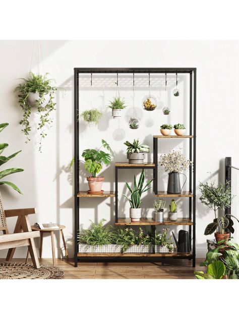 [Tall Plant Stand] With its 5-tier design, without occupying too much floor space. It makes full use of your vertical space, making it ideal for corners. The display rack is a perfect addition to your living room, dining room, patio, balcony, or garden.
[Large Capacity] The 7-tier design of this indoor plant stand provides ample space. Each shelf is wide and spacious enough to hold more than 8 regular-sized plant pots. The top wire shelf is perfect for displaying small bonsai. Additionally, it comes with 6 S-hooks for hanging display.
[Multi-function] The ladder shelf design of this garden plant stand allows for optimal storage and growth of plants, ensuring they receive sufficient sunlight. It can also serve as a versatile storage and display shelf for decoration, crafts, toys, books, pho Indoor Corner Plant Stand, Metal Plant Shelf, Ladder Plant Stand, Tall Indoor Plants, Indoor Plant Stand, Pot Organization, Garden Plant Stand, Corner Plant, Tall Plant Stands