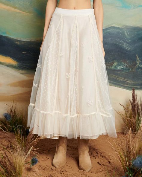 model wearing cream high waisted skirt in a bow embroidered tulle fabric, detailed with godets in a tulle dobby spot fabric. Tool Skirt, Puffy Tulle Skirt, Ruffle Midi Skirt, Tulle Long Skirt, Tulle Skirts, Tulle Flowers, Flower Skirt, Embroidered Tulle, Holiday Wardrobe