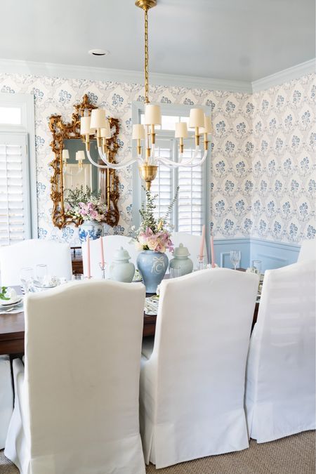 Dining room chairs and decor sourced here! Wallpaper gold mirror chandelier home decor grandmillennial style southern home #LTKhome Accent Wallpaper Dining Room, Dining Room Grand Millennial, Small Dining Room Wallpaper, Grandmillennial Dining Room, Grandmillennial Kitchen, Preppy Dining Room, Feminine Dining Room, Wallpaper Dining Room Ideas, Wallpaper In Dining Room