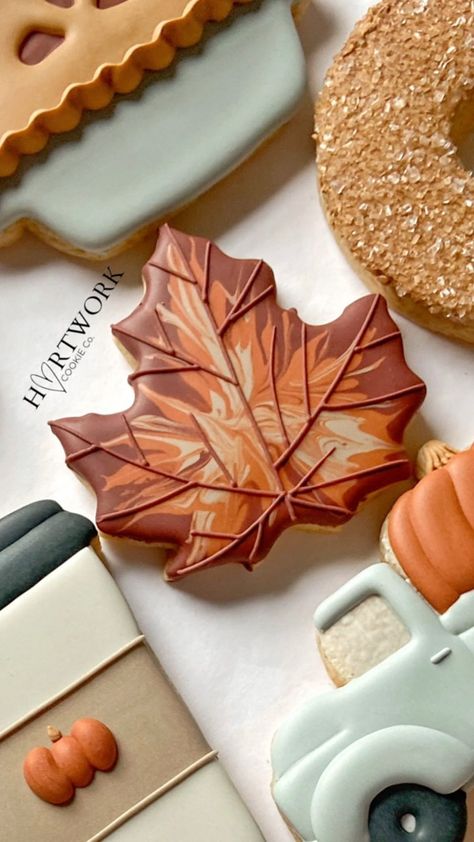 🎃What’s weird is that I really don’t like Halloween at all, but to date, this is probably my favorite set I ever made. The colors alone… | Instagram Thanksgiving Cookies Decorated, Maple Leaf Cookies, Royal Iced Cookies, Halloween Cookies Decorated, Halloween Sugar Cookies, Pumpkin Cake Recipes, Leaf Cookies, Sugar Cookie Royal Icing, Thanksgiving Cookies