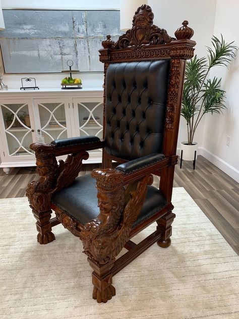 If you want to truly be the king of your castle, you need the astounding Maximus Throne Chair! This gorgeous piece of furniture will instantly become the focal point of any room. Hand-carved and hand-built by a European craftsman, using solid mahogany and top grain leather with hand-forged iron rivets. One of a kind. Dimensions: 68" high x 37" deep x 34" wide. Arm height: 32". Seat height: 19" King Throne Chair, Furniture 123, Unusual Decor, Grimm Brothers, King Chair, Kubler Ross, Wooden Work, Classic Furniture Design, Royal Furniture